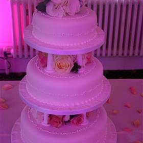 fwthumb3 tier cake filled with pastel roses & hydrangea.jpg